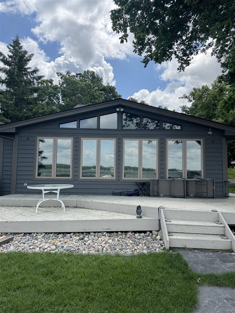 Residential window film installation on a lake home