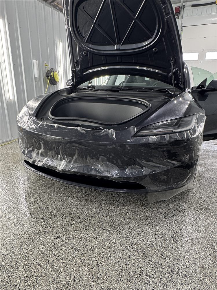 Before PPF install on Tesla front bumper